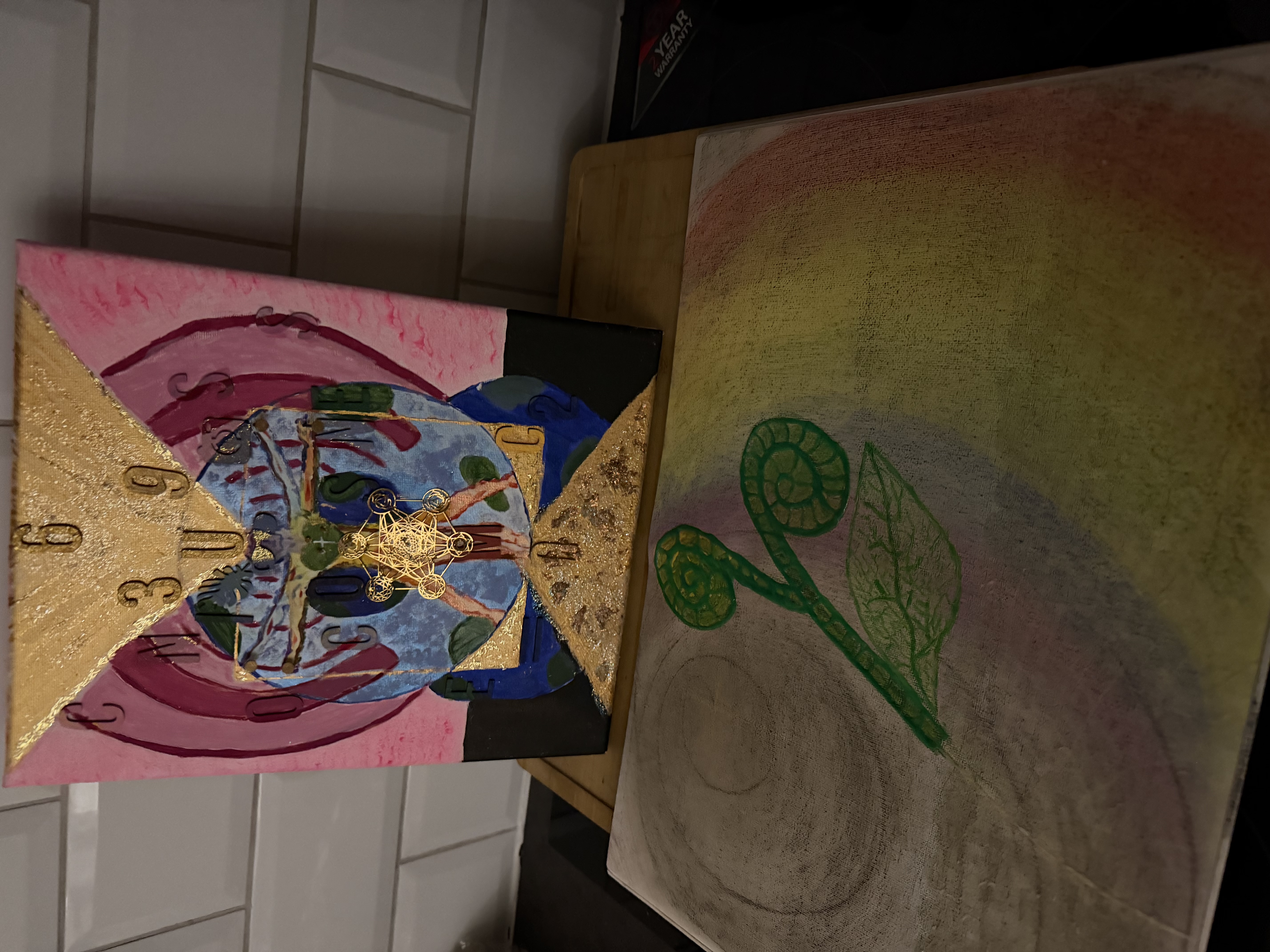 Genesis alongside its companion piece