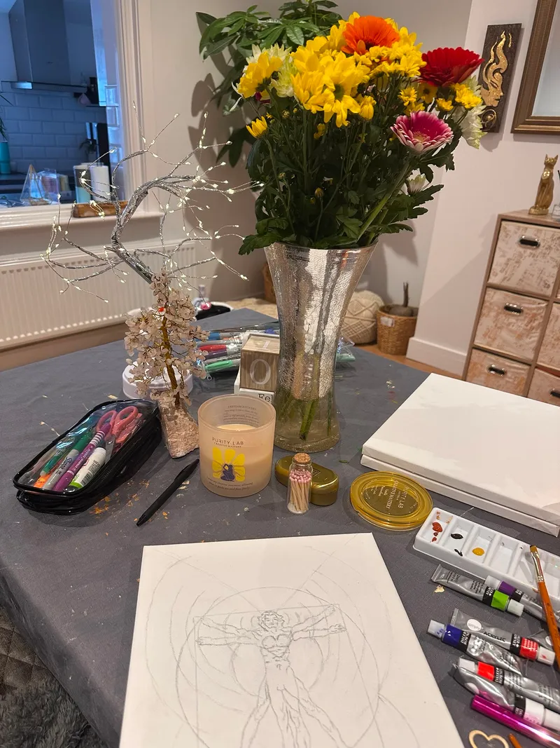 Canvas, pencil, rubber, candle, crystals, and a knock at the door.
